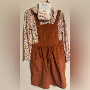 3 piece skirt set. Brown shirt White top w/ flowers, footed tights. New size 5T
